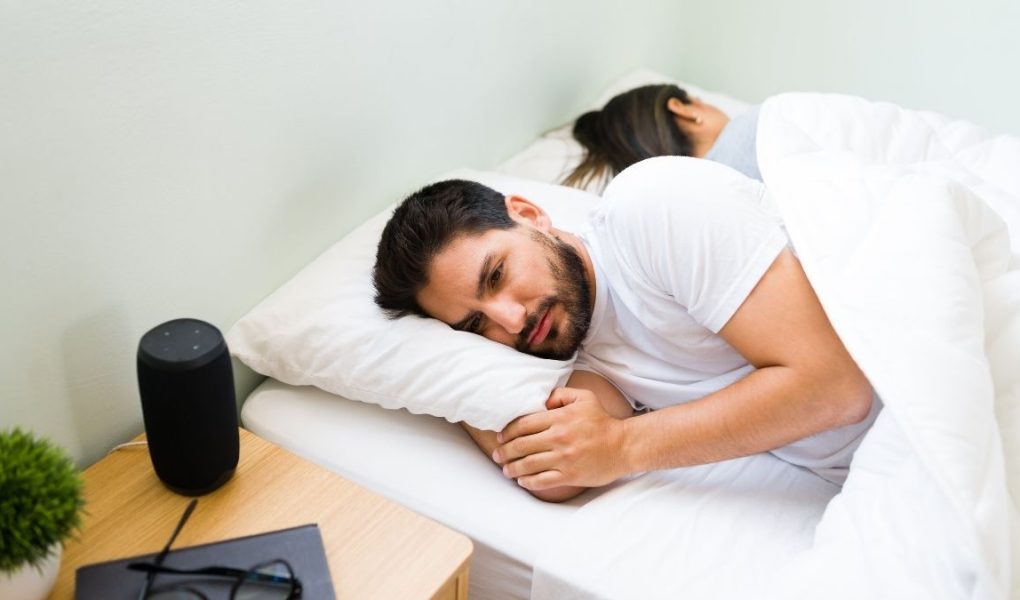 Man struggling with insomnia before starting sleep therapy for better rest