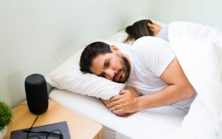 Man struggling with insomnia before starting sleep therapy for better rest